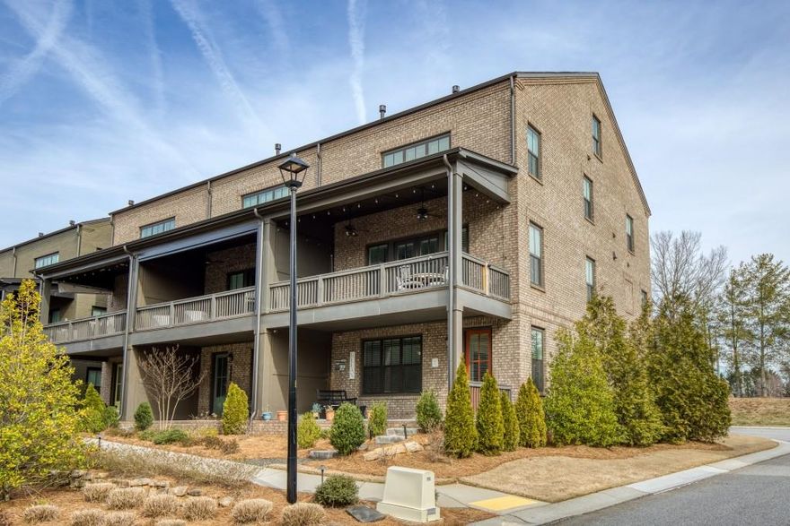 Gorgeous end unit townhome in the heart of Halcyon. Just steps from the Greenway, pool, and all the amenities Halcyon has to offer including restaurants and boutiques shopping. Enjoy two covered porches that overlook the beautiful green space. The open-concept living area features hardwood floors, lots of natural light, a ceiling fan, and a fireplace . The gourmet kitchen features stainless steel appliances, a gas stove, quartz countertops, tile backsplash, a large island, a beautiful butlers pantry, with a wine refrigerator, and a walk in pantry with custom built-ins and Elevator shaft. The large dining area can accommodate seating for 12 people. An office nook and a half bath complete the main level. Upstairs, an oversized primary  suite features a luxurious bathroom with a double vanity,  walk-in shower, private water closet, and a oversized master closet.  Two oversized  bedrooms upstairs are have  plenty of closet space. Upstairs laundry room closet  in the hallway. The lower level features a bedroom/bonus room, ideal for a home office, gym, or media room, plus a full bath. The two-car garage has ample room for storage.