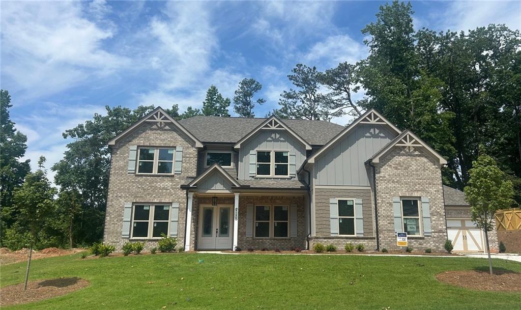 Penny Plan Lot 59: 5BR/ 4.5BA SPECIAL PRICING THROUGH SUNDAY! HOME ALMOST READY FOR MOVE IN. Explore living in the GATED community of Sierra Lake. Located in Cumming, Georgia, a town known for its historic charm and recreational opportunities. This new construction home spans over 4,000 square feet with 5 bedrooms and 4 1/2 bathrooms accommodating multi-generational living. Key features include a LARGE LOT, cul-de-sac, media room, a main-level bedroom with private bathroom, a formal dining room, an office or living room, a 4-car garage, covered deck, and a coffee bar. The unfinished basement offers endless potential for future expansion, tailored to the homebuyer's vision and lifestyle. The community features a clubhouse, pool with water features, over a mile of walking trails, playground, play field, fishing dock, and frisbee golf to name a few. Here, you can enjoy the historic downtown area, community events, and the natural beauty of the region, all while being conveniently located with easy access to GA-400. Our decorated model located in the community is the same floor plan. It can be toured at 4020 Sierra Knolls Court Cumming, Ga 30040. File photos. Home is Under Construction.