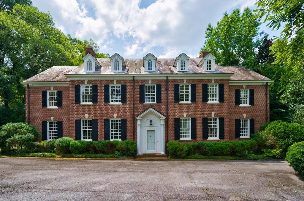 Classic southern Georgian home w/exceptional privacy tucked away in the heart of Buckhead on 3.649+/- level acres of mature landscaping. Large original entrance hall, oversized living spaces & wood paneled library offer beautiful garden views. Updated kitchen & keeping rm open to an architecturally complementary brick patio & pool. 4 bedrooms on the 2nd floor include primary suite w/dual baths, walk-in closets & spare rm for exercise/playroom. 3rd floor space w/addtl storage rms is ideal for office, rec rm and/or guest suite. This is truly a one-of-a-kind property.