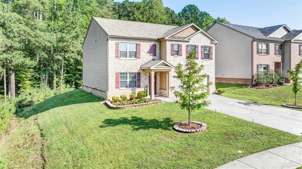 Welcome to 1235 River Oak Ln — where space, style, and Southern charm come together in Loganville's most sought-after neighborhood. Be the second owner ever of this beautiful maintained 5-bedroom, 3-bath home sitting on a generous, private lot. The home offers the perfect blend of comfort and functionality. Step inside to find a sunlit, open-concept layout and tasteful upgrades throughout. The spacious kitchen features granite countertops, stainless steel appliances, and a large island perfect for entertaining. Upstairs, the oversized primary suite boasts a spa-like bath and ample closet space. Enjoy quiet mornings or summer gatherings in the oversized backyard. Located in a friendly, well-established community with easy access to top-rated schools — this home is the ideal retreat for southern living. Don’t miss your chance to call this Loganville gem home.
