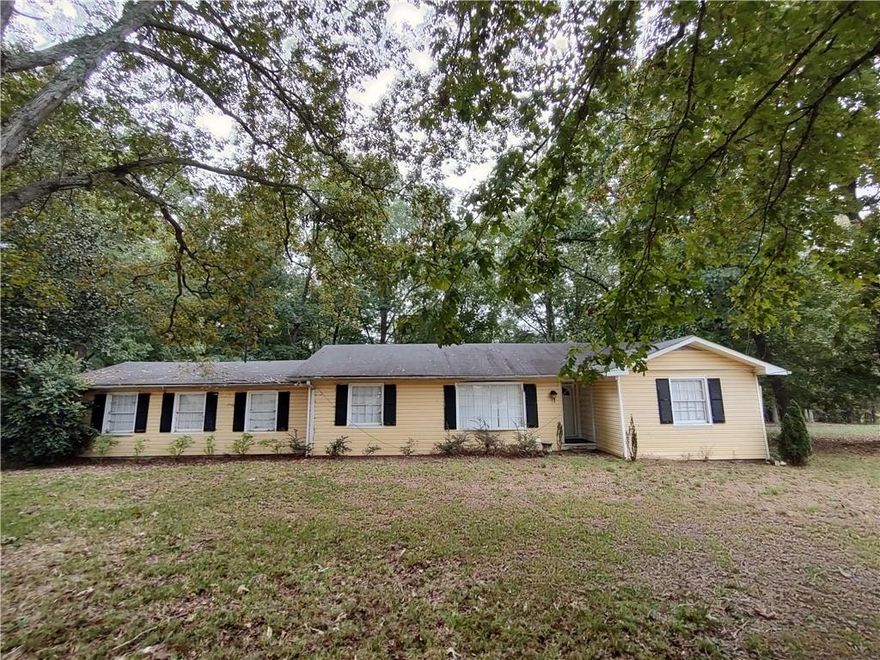 Large ranch style home with spacious lot! Includes updated kitchen with stainless appliances and tile backsplash, spacious bedrooms, and renovated bathrooms. Enjoy the large trees that provide plenty of shaded yard area. This charming single-family home is nestled in a vibrant and welcoming neighborhood, offering the perfect blend of city convenience and suburban charm. Easy access to shops, restaurants, and major highways for convenient commuting. Experience the perfect blend of style, comfort, and location! Schedule a viewing today and make this gem your own!