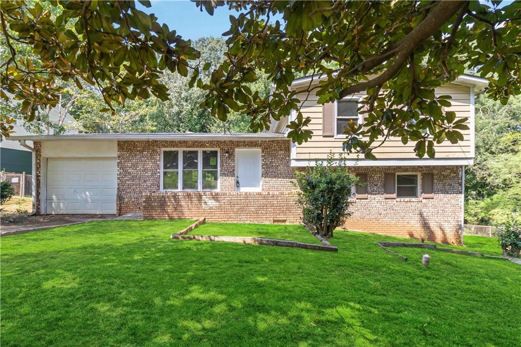 Nestled in a quiet well established neighborhood, this 4-bedroom, 2-bath property is the perfect canvas for your vision. Whether you’re an investor searching for your next addition to your portfolio or a homeowner ready to gain sweat equity, this fixer-upper is full of potential.
Inside, you’ll find an open layout starting with a bright living room filled with natural light, original hardwood floors, spacious bedrooms upstairs, a large flex space on the lower level and tons of storage.
Step outside to a generous backyard with covered deck and endless possibilities for outdoor living—create a private retreat, garden, or play area. A garage and ample driveway parking add to the convenience.
Close to public transportation, schools, shopping, and dining, this home offers both location and opportunity. With updates, it can be transformed into a beautiful home or profitable investment. Don’t miss your chance—schedule a showing today!