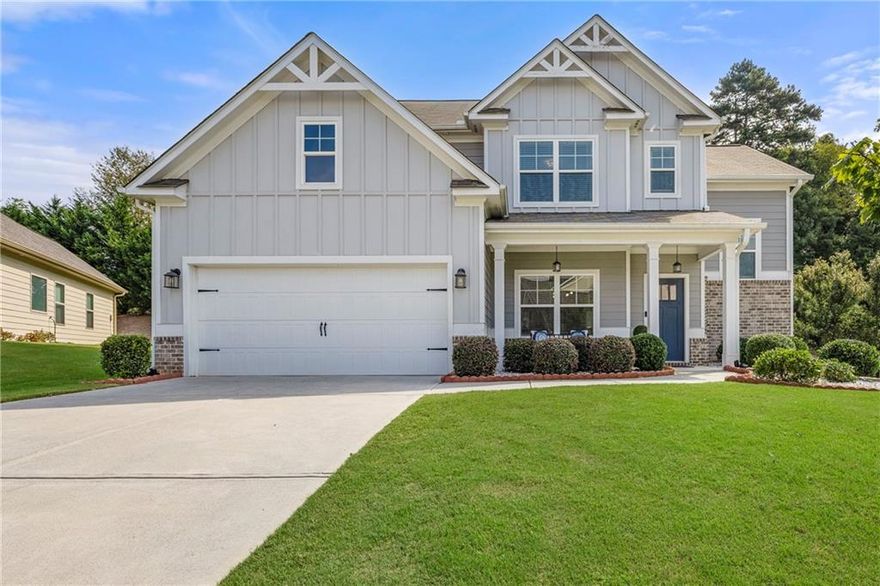 This stunning impeccably maintained home is located in the popular Lakes at Franklin Goldmine and sought-after highly desirable West Forsyth High School district. Step in from the covered front porch with a seating area into bright foyer that leads to the sun field formal dinning room with modern paneling and high end lightning. Open concept kitchen and living space features include LVP floors, white cabinetry, stone countertops, stainless steel appliances, walk in pantry and kitchen island. The family room with fireplace is perfect for family nights, entertaining guests or simply relaxing. Beautiful hardwood steps will take you to the second floor that feature a spacious Master bedroom with tray ceiling, en-suite bathroom with double vanities, large shower with dry area and walk in closet with built ins with drawers , shelves and hanging rods. In addition to master suite, 3 secondary bedrooms, each with walk in closets are spacious for kids or guests. Secondary full bathroom comes with shower/ tub combo and double vanity. Laundry room is conveniently located on the second floor. Outdoor with covered patio, ceiling lights and overlooking private backyard feels like a oasis that you can enjoy anytime of the year. 
The Lake at Franklin Goldmine is a wonderful community with swim, tennis and playground. Conveniently located near great schools, shoppings, and dinning. Low Forsyth County taxes are like a cherry on top.