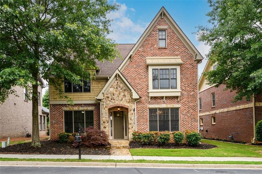 BEAUTIFUL 4-sided brick home on level lot. PRIME LOCATION! AWARD WINNING SCHOOLS!! New hardwood floors throughout.  Modern kitchen with lots of cabinet space, new upgraded Kitchen-aid appliances, under counter lighting, butler's pantry, separate breakfast area, pantry and open to the family room.  Family Room filled with tons of natural light all day long. Family room boast built-ins and gas logs in fireplace. Upstairs features an enormous Master Suite w/ trey ceiling and master bath with double vanity and a huge walk-in closet that is hard to find in many homes these days. 2 spacious secondary Bedrooms with good size closet on the second level perfectly serves the needs of families with children. Laundry room is conveniently located upstairs for easy access to all bedrooms. An ADDED BONUS "THIRD FLOOR" with attached full bathroom is a unique feature to this house that provides perfect space for a Teen suite/Hobby/Media room or just use it as yet another bedroom. Additional storage and separate HVAC make it even more desirable. Last but not the least the cozy covered patio will be lovely to enjoy your morning coffee or evening wine. This Home is in a very family friendly neighborhood with lots of children around. It is move-in ready house with easy access to GA 400 and just minutes away from Halcyon's premier shopping, Big Creek Greenway Trail, Emory and Northside Hospital, Schools, Parks, Restaurants, Library and many more. A Must-See Beauty... Won't Last Long...So Hurry !!