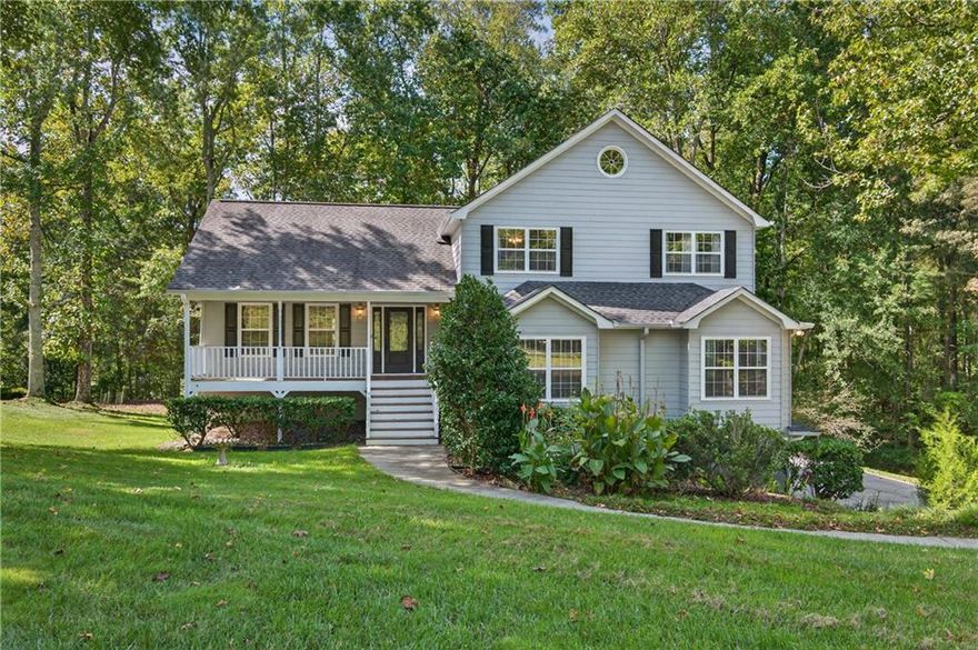 Back on the market! Stunning 4-Car Garage Split-Level Retreat on Over an Acre. Welcome to this beautifully maintained split-level home, nestled on a private 1+ acre lot with a peaceful creek running through the property. The inviting curb appeal begins with a charming front porch and landscaped grounds surrounded by mature trees, offering both privacy and serenity. Inside, you'll find updated hardwood floors, fresh carpet, and soaring ceilings that create a warm and open atmosphere. The spacious family room is anchored by a cozy brick fireplace, perfect for relaxing evenings at home. A versatile bonus room provides endless possibilities, whether you need a home office, gym, or playroom. Car enthusiasts and hobbyists will appreciate the expansive 4-car garage, dedicated workshop, and additional trailer parking, offering unmatched space and flexibility. Step outside to a covered patio overlooking the lush backyard, an ideal setting for entertaining or unwinding in nature. This rare property combines functionality, comfort, and style, all within a tranquil setting, a true retreat that still keeps you close to everyday conveniences. Buyers: Get up to $5,000 toward closing costs + 2-1 temporary buydown (if eligible) with preferred lender Kit Noles, Neighborhood Mortgage, Inc. (NMLS #1392470).