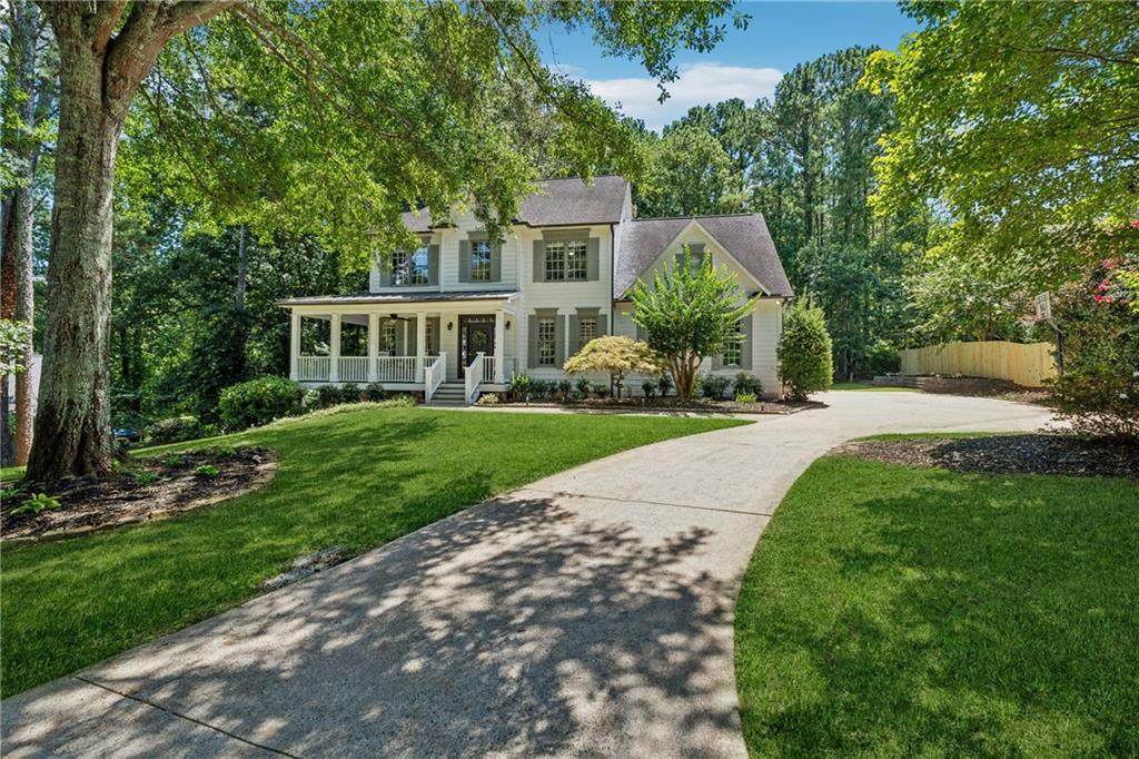 Experience modern luxury in the Longwood Community with this meticulously maintained 6-bedroom, 4.5-bath residence that embodies comfort, elegance, and convenience in a quiet, prestigious neighborhood. PLEASE note this home backs to an acre and a half of protected green space that will NEVER be built on due to city restrictions and zoning guidelines, providing lasting privacy and a natural buffer. The home welcomes you with sunlit, expansive living areas and a fully finished basement that includes two generously sized bedrooms with walk-in closets and a full bath. The gourmet kitchen has been beautifully remodeled and features custom cabinetry, high-end stainless-steel appliances, a premium oven, a large island for gathering, and a bright breakfast room.
The primary suite offers a true retreat with a cozy sitting area, dramatic tray ceiling, newly renovated spa-bath with soaking tub, and two walk-in closets. Upstairs, three additional well-sized bedrooms each provide walk-in closets. Jack and Jill bedroom share one bath and the third bedroom as its own en suite. Outside, a wrap-around front porch invites morning coffee and evening conversations, while a large deck overlooks a private, nature-rich backyard perfect for a luxury pool and quiet enjoyment or outdoor entertaining.
Recent updates enhance the home's appeal: fresh exterior and interior paint, updated floors throughout, and a newly remolded kitchen. Which makes this home feel better than new. The residence is ideally located within the Longwood area, with Denmark High and Midway Elementary just half a mile away. Fowler Park sits 1.5 miles away, offering walking trails, an indoor track, extensive athletic facilities, a fitness center, a dog park, and more, with easy access to Big Creek Greenway.
Commuting is effortless with quick access to GA 400, ideal for a smooth morning drive or weekend getaways to the North Georgia mountains. World-class shopping, dining, and entertainment at Avalon, Halcyon, and The Collection at Forsyth are all just 10–12 minutes away. The property also benefits from low Forsyth County taxes, enhancing its value and appeal. Schedule your private tour today to discover the luxury, comfort, and exceptional lifestyle that await.