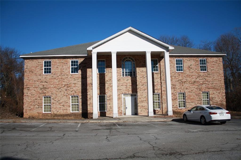 PRICE IMPROVEMENT...Seize the opportunity to transform this 9,000+sq. ft. commercial building to fit your vision! Whether you are looking to develop a daycare center, business complex, office space, or another creative venture, zoned general commercial, the options are endless. Second floor is partially renovated with drywall, electrical, and plumbing in place, awaiting your final touches. First floor is a blank canvas, with electrical, plumbing, and ductwork, ready for buildout to meet your needs. Located off of Fairburn Rd., walking distance to downtown Douglasville, and minutes from the highway. This spacious gem awaits your creative conversion!