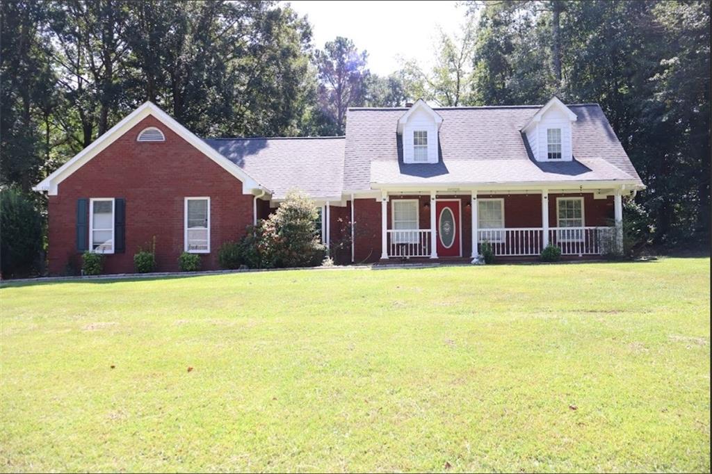 Welcome home to this beautifully updated 3 bed, 2.5 bath Fayetteville brick retreat on 2 acres! The main-level master suite offers a spa-like bath with garden tub and separate shower. Enjoy a cozy fireplace in the family room, granite counters in the kitchen, and brand-new appliances under warranty. With fresh paint, new flooring, new HVAC, and stylish fixtures throughout, it’s completely move-in ready. Upstairs, you’ll find two spacious bedrooms and an office/flex area. A 2-car garage plus workshop pad adds extra value. Don’t miss this perfect blend of comfort and convenience!