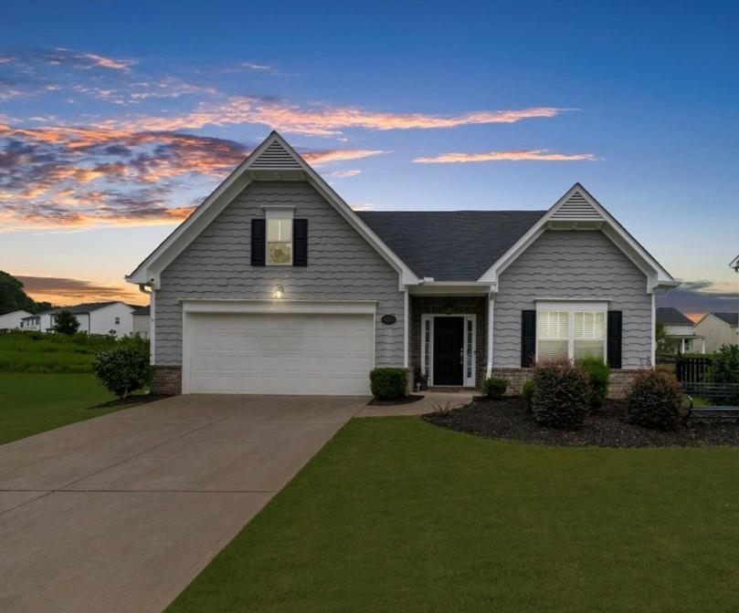Welcome to Lake Haven! Nestled in the popular Lake Haven swim/tennis community and zoned for highly rated West Forsyth High School, this charming RANCH home is one of the most popular floorplans for a reason! From the moment you arrive, you’ll love the curb appeal and quiet cul-de-sac feel. Step inside to an open, light-filled floor plan with neutral finishes and a spacious layout that flows effortlessly throughout.
The kitchen features stone countertops, a gas range, tons of storage, and a huge walk-in pantry—all open to the dining area and main living space, perfect for entertaining. The oversized primary suite includes a tray ceiling, generous bathroom with double vanities and a separate shower, and a large walk-in closet. Off the garage, you'll find a roomy laundry area with additional storage space.
Out back, enjoy a flat, fenced yard complete with a firepit, perfect for relaxing evenings outdoors. With a true step-free ranch floorplan, low-maintenance living, and unbeatable location, this home checks all the boxes!