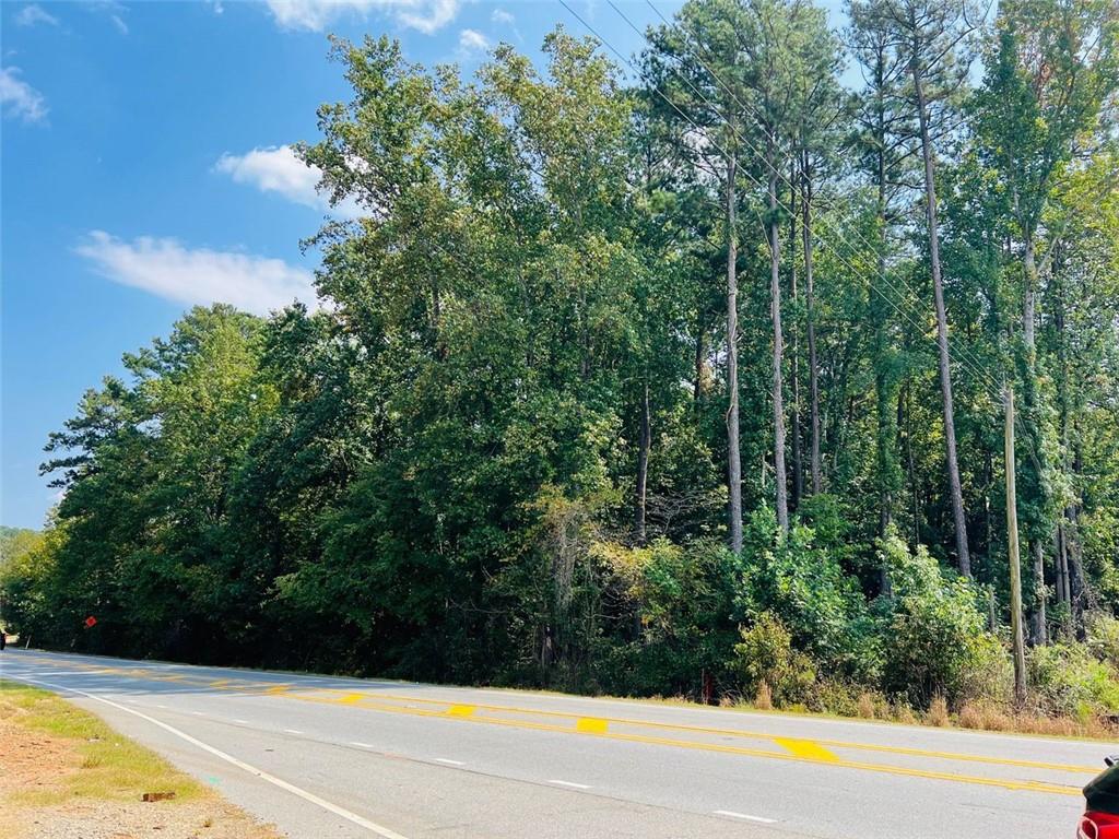 3 ACRES along the RAPIDLY evolving Winder Highway Corridor where Gwinnett County is actively investing in infrastructure and economic development! YES, this parcel sits directly within Gwinnett County's future development corridor. BUYERS, DEVELOPERS, INVESTORS seeking strategic long-term upside? GDOT is upgrading intersections and access points increasing visibility, improving traffic flow and safety both here and along the super close SR316.
Offering over 300 feet of prime road frontage in Dacula, and within minutes of the transformative Rowen Knowledge Community a 2,000 acre innovation district designed to attract bioscience, tech and education-based employers - driving demand for housing, retail and services.
These initiatives position this property as a strategic acquisition for developers and investors looking to capitalize on Gwinnett's next wave of growth!!
This property has rezoning potential. With nearby parcels transitioning to C-2 Commercial, Mixed-Use and RM-13 Multifamily, this site could be repositioned for Townhome or apartment development, Retail or office space, Flex Commercial or Live/work units.
**1 mile from Stars and Strikes Family Entertainment Center.**
**Nearly directly across the street from the Dollar General store**
Make us an offer!