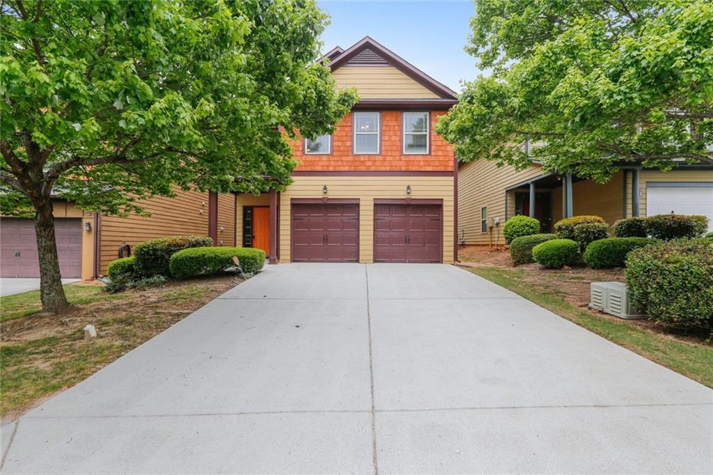 Welcome to this beautiful3-bedroom, 2.5-bathroom home in the sought-after Arnold Mill Station community. Step into a bright two-story foyer that opens into a spacious, open-concept living area—perfect for relaxing or entertaining by the cozy fireplace. The updated kitchen features elegant cherry cabinets, generous pantry space, and modern finishes that are sure to impress. Upstairs, retreat to the serene primary suite with tray ceilings, a walk-in closet, and a spa-like en-suite bathroom complete with a luxurious soaking tub. Enjoy outdoor living on the back patio, ideal for grilling and enjoying sunny afternoons. Conveniently located near shopping, dining, and parks, this stunning 2-story home offers both comfort and convenience. Schedule your tour today—this home won’t stay on the market for long!