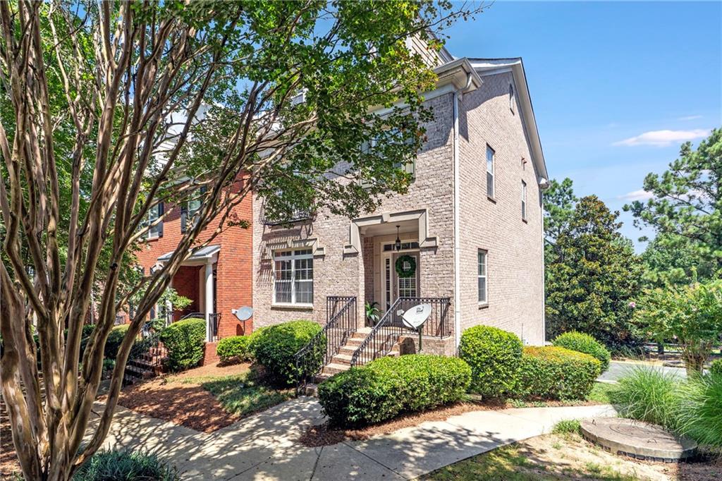 Charming 3-Bedroom End Unit Townhome + Finished Basement with Bonus Room in Gated Community!
Step into comfort and timeless style in this beautifully maintained end unit townhome, offering 3 bedrooms, 2 full baths, and 2 half baths, including a flexible finished basement. Located in a secure, amenity-rich gated community, this home combines privacy, convenience, and thoughtful design.
Natural light fills the main level, where an open kitchen flows effortlessly into the family room—ideal for both everyday meals and entertaining. A butler’s pantry adds functionality and elegance, while a cozy fireplace creates a perfect focal point in the spacious living room. Just off the main living area, a generous deck invites you to unwind outdoors.
Upstairs features three comfortable bedrooms, including a relaxing primary suite, and two full bathrooms. A half bath on the main floor adds everyday ease, while the basement offers a bonus room with its own half bath—perfect for a home office, gym, or media lounge.
Set at the end of the row, this townhome enjoys added privacy and a peaceful atmosphere. The view from the front door is truly picturesque, setting the tone for the charm within. You’re just minutes from great schools, everyday shopping, dining, and major commuter routes. Plus, you're close to all the excitement of Truist Park and The Battery.
If you're seeking a low-maintenance lifestyle in a prime location with space to grow and entertain, this is the one.