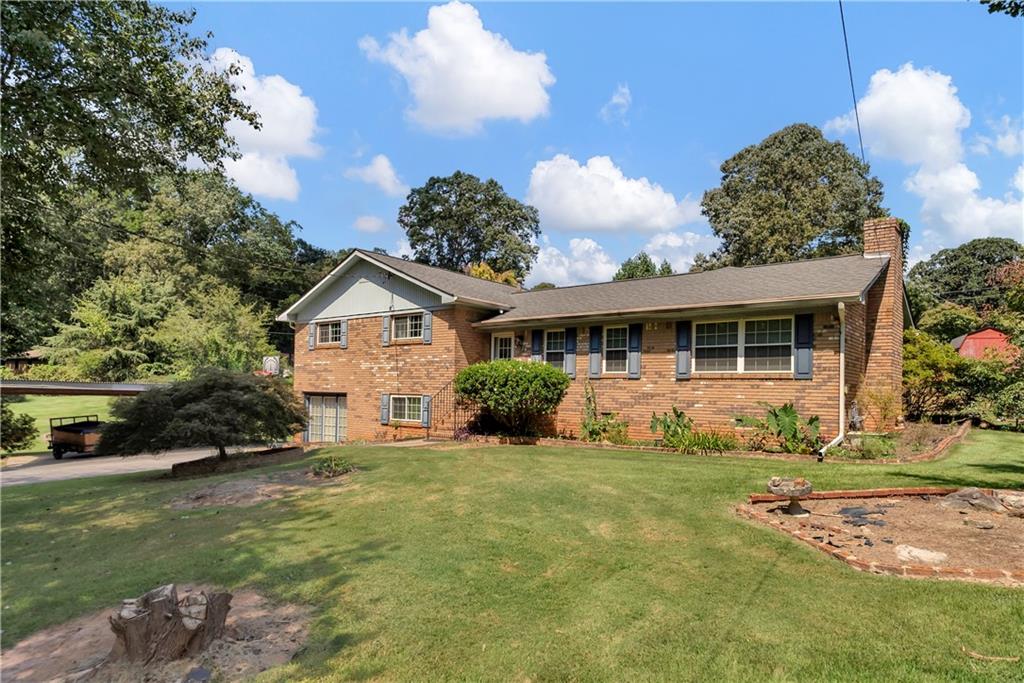 *****Professional Photos coming soon***All-brick ranch with inground pool just minutes from Downtown Woodstock! This spacious 3BR/2BA home offers 2,448 sq ft of living space on a partial basement. Enjoy a bright and open floor plan featuring a large four-seasons room, new luxury vinyl plank flooring, and plenty of natural light. Relax or entertain around the private inground pool. Solid four-sided brick construction, convenient location close to shopping, dining, and entertainment in Woodstock. A rare find combining space, updates, and prime location! This one has tons of potential!