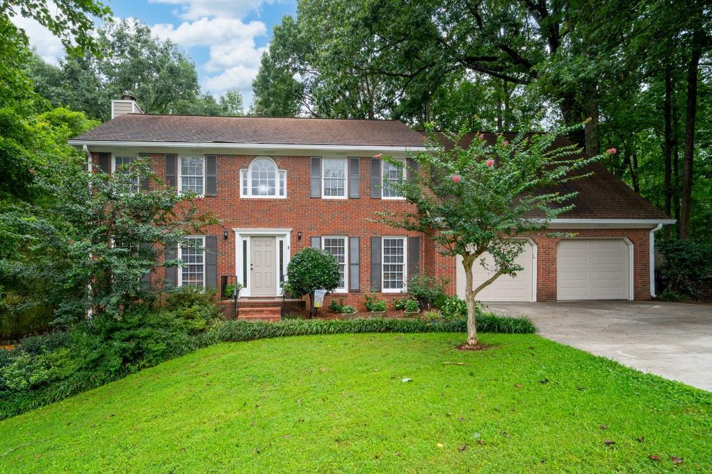 Possible 2nd driveway, possible in-law/teen suite, no HOA, pool, partial kitchen in basement, new deck, updated kitchen, newly smooth ceilings, retaining wall and firepit area.....this house has SO MUCH!! Incredible opportunity to be close to Smyrna and Marietta. Plus this house has SO MANY upgrades. With a recent $30,000 kitchen remodel that includes redone cabinets, new pulls, New farmhouse sink, leather textured granite, LVP flooring, butcher block countertops, and new lighting. Ceilings have all been recently smoothed for approximately $7500. Large Dining room and large study or formal living room, flex space that could be used for anything! Master has trey ceiling and double doors. Master bath is tiled with upgraded tiled shower and stand along soaking tub, quartz countertops, ceiling fan...upgrades approximately $18,000. 2 more additional bedrooms upstairs and a media room/exercise room or game room. Full finihsed basement with gas logs, bedroom, kitchen and dining room and family room or game room with full bath with walk in shower and a half bath. Walk out basement to large cemented deck with large new deck and very private backyard. Yard is fully fenced. Room for parking a boat, RV/Camper, or could be driveway for in-law/teen suite. Pool is wonderful on these hot summer days, recently add a motor, valve and piping in 2024. Pool has a cover with a spring and latch system that work great. This house just keeps going and going with the upgrades, storage, fun places to play and live. It has it all!
