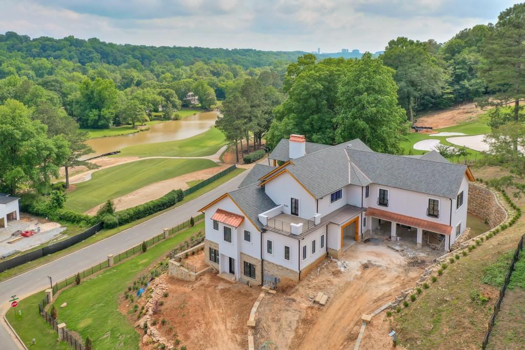 LOCATION! Stunning NEW Build in Atlanta Country Club on the course- low Cobb County taxes and top ranked school district. Top quality craftsmanship and building products. Incredible views of hole #3 and #4 green the golf course as well as the Chattahoochee River. Space for an elevator. Floor plan linked. Flat fenced backyard and plenty of space for pool. Whole house water purification system. Get in early to pick out final finishes. Great access to Columns Drive for in town commutes or to enjoy the river park trail. House projected to be completed in 5 weeks!