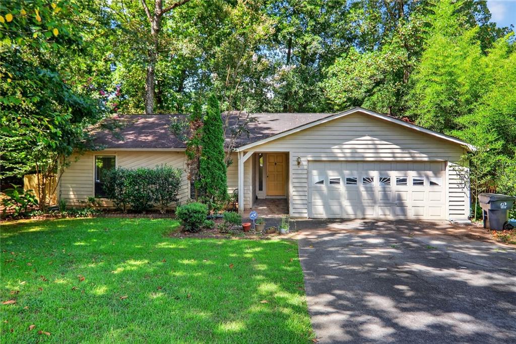 Awesome floor plan in great location and established neighborhood. Paver entryway leads to desirable split bedroom ranch, with huge great room, wet bar, custom fireplace, four season sun room, large kitchen with dining room. Primary bedroom features spa tub, private bath, large walk in closet and access to deck. Two additional bedrooms, guest bath. Laundry closet and two car garage. Great location convenient to highways, restaurants, grocery stores, shopping and stores. Don't miss this golden opportunity to get in at a good price and make it your own!
Tax records do not reflect correct square footage. Appraisal - 1873 square ft.