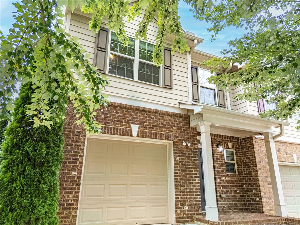 You don’t want to miss this beautiful end-unit townhome featuring 3 bedrooms and 2.5 bathrooms! This home offers a spacious open-concept layout with stainless steel appliances and a large island in the chef’s kitchen overlooking the dining and living areas. Gorgeous hardwood flooring runs throughout the main level, with plush carpet upstairs. The oversized owner’s suite includes elegant tray ceilings. Located in a great school district with easy access to I-85 and just minutes from the Mall of Georgia. Water has been turned off due to safety concerns.