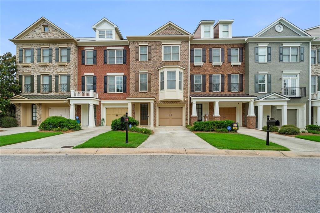 Welcome to the epitome of luxury living in this stunning & spacious 2 bedroom / 2.5 bath townhome nestled in a popular gated community. This upscale gem boasts three levels of sophistication and offers a lifestyle defined by comfort, convenience, and style.
As you enter, you'll be greeted by the open floorplan adorned with beautiful hardwood flooring, creating an inviting atmosphere throughout the main level. The spacious family room features custom shelving, providing both functionality and an elegant touch. Natural lighting floods the space, creating a warm and welcoming ambiance.
The heart of this home is the updated chef's kitchen, a culinary haven equipped with stainless steel appliances, Corian countertops, an island/breakfast bar, and gorgeous cabinets offering ample storage space. Connected to the kitchen is a spacious sunroom that leads to a cozy deck, perfect for enjoying the outdoors and entertaining guests.
Venture to the third level, where luxury awaits in the grand master suite. Hardwood flooring adds a touch of opulence, while a sitting room provides a tranquil retreat. The master suite also features a large walk-in closet and a spa-like master bath, offering a haven for relaxation after a long day.
A generously sized secondary bedroom with a full bath and walk-in closet ensures comfort for guests or family members. The terrace level presents an oversized room with endless possibilities, allowing you to tailor the space to your needs and lifestyle.
Beyond the elegance of the townhome itself, the community offers a grand resort-style clubhouse. Residents can indulge in the luxurious amenities, including a swimming pool, tennis courts, a playground, and a fitness center. The convenience of this location is unparalleled, with easy access to I285 and I20, making commuting a breeze. Additionally, you're just minutes away from The Battery, Silver Comet Trail, the airport, downtown Atlanta, restaurants, and more.
Experience a life of sophistication, convenience, and leisure in this rare and upscale townhome – a true haven that seamlessly combines modern luxury with the comfort of home.