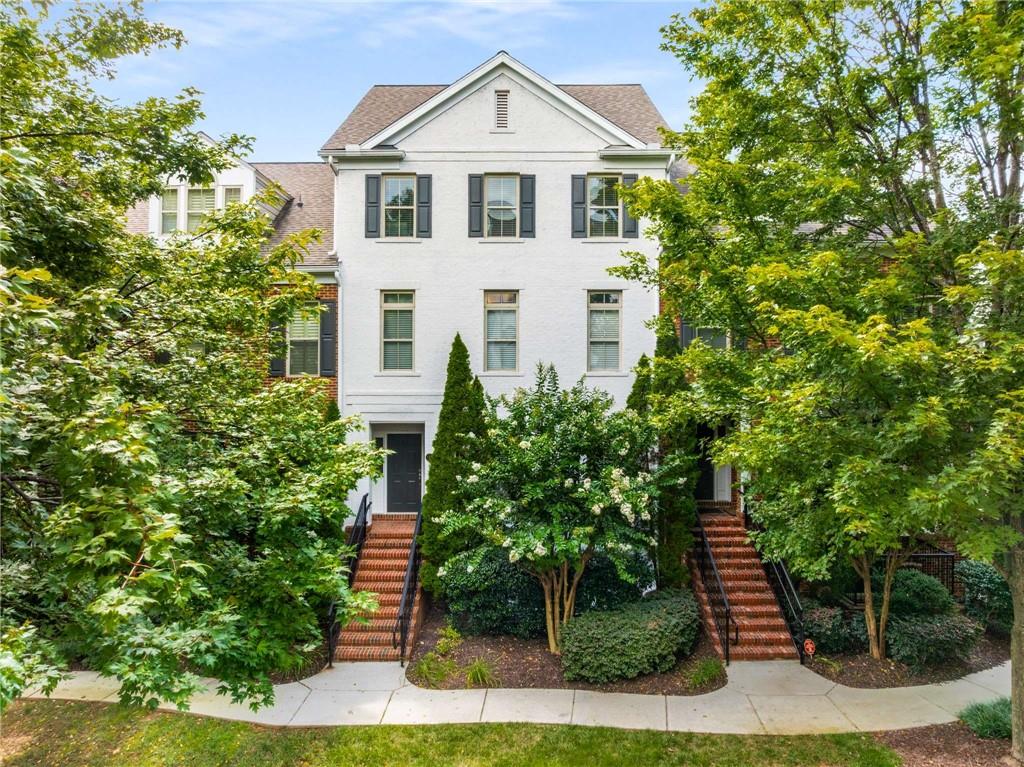 Discover the perfect blend of style, comfort, and convenience in this beautifully updated townhouse. Ideally situated in a highly sought-after neighborhood of Sandy Springs, this home offers easy access to shops, restaurants, parks, City Springs and Performing Arts Center and major commuter routes—everything you need is right at your doorstep. Step inside to find a bright, open layout with fresh finishes, high ceilings and gleaming hardwood floors throughout. The updated kitchen has custom cabinets, granite countertops, large pantry and a separate bar with a second sink. Spacious fireside living and dining areas flow seamlessly to a private balcony with beautiful views—ideal for relaxing or hosting friends. Main floor boasts an additional spacious separate den perfect for an office and additional sitting area. Upstairs, you’ll find a generously sized serene primary suite with a large renovated private bath and walk in closet. Two additional bedrooms with large windows overlooking the trees with a shared updated bath. Additional highlights is a spacious one car garage with a second driveway parking space. The community is beautifully landscaped with nice shared spaces and plenty of guest parking. With its prime location, thoughtful updates, and inviting atmosphere, this townhouse is a rare find you won’t want to miss.