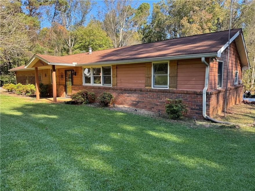 Motivated Sellers!  Amazing investment opportunity in this home located in a prime Canton location!  Just 6 minutes to I-575 Express Lanes, 3 minutes to the future Holly Springs Town Center, 13 minutes to downtown Woodstock, and 13 minutes to downtown Canton.  Situated on a picturesque lot in a quiet residential area, this home has so much potential!  It features an open concept living room, dining room and kitchen with two bedrooms and two baths as well as a third room that could be used as a bedroom (does not have a closet).  Home is part of an estate and is being sold as-is, no disclosure.  This home is currently on a well, but can easily be connected to County water.  Cash buyers only please.
