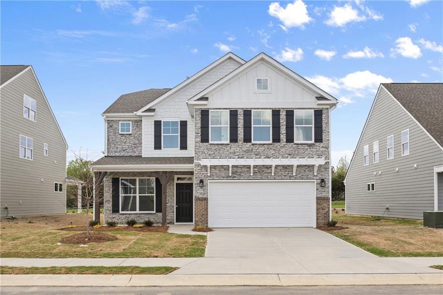 BIG RED BOW EVENT – RECEIVE $25,000 FLEX CASH OR SPECIAL RATE FINANCING – Ask for details. Ready now. The Drexel is a two-story, four bedroom, two-a-half bath home with a home office, formal dining room, kitchen with island and a pantry, a spacious great room, and a covered porch. The second floor features four bedrooms, including the primary suite with a large closet, an upstairs laundry and additional full bath and loft area.