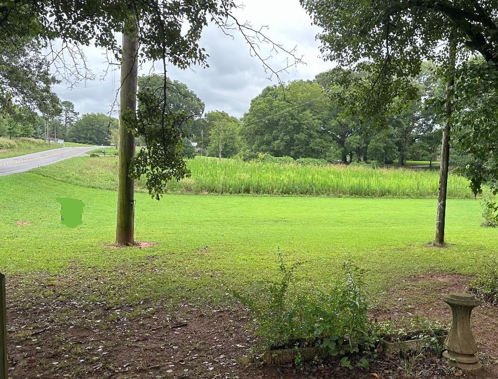 Beautiful LEVEL build site! MILLION DOLLAR HOMES NEARBY! Located in highly sought after Cherokee County in the Creekview, Creekland and Avery School Districts. Secluded Home Site with mature trees and recently cleared underbrush. Easy to Walk and See. Protective Covenants. No HOA. Covenants and Plat in Documents. There is a 60ft. road frontage on E. Cherokee Drive. Lot 5 has an existing 40ft driveway permit approved by Cherokee County. The remaining 20ft road frontage is an exclusive ingress/egress, utility easement for lot 4 which is located behind lot 5. Level 3 Soil Test has been completed and is available upon request.