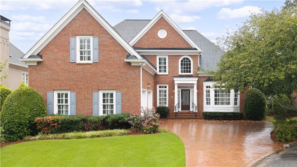 This is it -- the four-sided brick home you have been waiting for set in a desirable cul-de-sac in the fabulous Littlebrooke section of Brooke Farm!!! The spacious primary suite on main with trey ceiling includes updated bath and closet organizer system. Enjoy your morning coffee on the private deck off the primary and view the fully fenced backyard! Adjacent to the primary is a formal living space perfect for a sitting room or home office -- ideal for main floor living! Gorgeous hardwoods throughout!! The heartbeat of the house is the white kitchen with island and Taj Mahal quartzite counters; gas cooktop, double ovens, built-in microwave drawer, and very generous pantry storage. The eat-in seating that flows effortlessly into the bright sunroom! Upon entering the home, you are greeted with an abundance of natural light from the floor to ceiling windows in the great room. Adjacent to the great room is the formal dining room. And if you want to be outside but want to get away from the sun, the covered deck just off the sunroom provides the perfect shady retreat or a grill master's cooking station. Upstairs, three well-appointed bedrooms include one with an en-suite bath and two sharing a Jack-and-Jill layout. The fully unfinished daylight basement offers endless possibilities—media room, workshop, fitness studio, or hobby space—customize it to suit your lifestyle. As part of the Brooke Farm community, residents enjoy first-class amenities including a pool, tennis courts, a serene private lake, and maintenance-free lawn care, all included in the HOA dues. Just minutes to Dunwoody Village and the Perimeter area, you'll have access to some of Atlanta’s best shopping, dining, and everyday conveniences—all while tucked away in a quiet, established enclave.