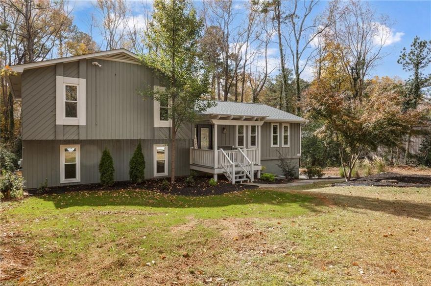 Beautifully Renovated Home on a Large, Level Lot in East Cobb!

Welcome home to this completely renovated 4-bedroom, 3-bath beauty tucked within a quiet, well-kept neighborhood in a great East Cobb location. Every detail has been thoughtfully updated to blend timeless design with modern comfort.

Step inside to an inviting open layout featuring new luxury vinyl plank flooring throughout, fresh interior paint, and stylish new fixtures. The designer kitchen is the heart of the home—showcasing a large island with seating, farmhouse sink, brand-new stainless steel appliances, soft-close cabinetry, and a view into the spacious living room with a cozy fireplace and elegant arched transitions.

The remodeled bathrooms exude modern style with beautiful tile-work, sleek vanities, and premium finishes. Enjoy peace of mind with a brand-new roof, gutters, siding, new blown-in insulation, exterior paint, windows, and a new back porch—all set on a large, level lot ideal for play, gardening, or entertaining.

Located minutes from shopping, grocery stores, parks, and top-rated schools, this home offers the perfect balance of convenience and comfort. The neighborhood also features an optional swim/tennis and playground, giving you access to an active community lifestyle without mandatory fees.

This move-in-ready East Cobb gem truly has it all—modern updates, stylish design, and a spacious yard in a fantastic location. More pictures coming soon!