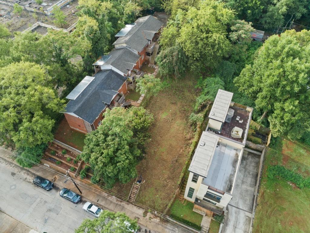 Located in Mechanicsville, this 50’ x 180’ lot comes with approved duplex plans and an active building permit—ready for immediate construction. The lot is cleared and zoned SPI-18 SA6. Just blocks from the GSU stadium, Summerhill’s Publix-anchored shopping center, and the restaurants and breweries along Georgia Avenue. Quick access to I-75/85 offers strong connectivity. A straightforward opportunity for development in a growing area.