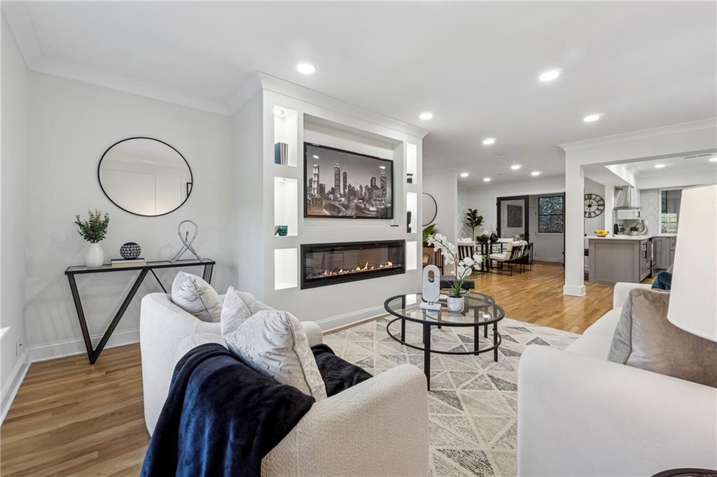 Rare, rare, fully renovated luxury condo living opportunity in the gated and private Cross Creek subdivision. This top-floor home has been newly renovated, custom lighting, and sleek black hardware finishes. The kitchen showcases a modern two-tone cabinetry design with quartz counters, stainless KitchenAid appliances, and a geometric backsplash. It is open to and overlooks the sunroom, creating a bright and versatile space perfect for dining or entertaining. The dining room has a 3d decorative wall panel complete for entertaining. . The living room features a built-in fireplace wall with illuminated shelving, while oversized bay windows with deep sills provide charming window seating. The spacious floor plan offers large bedrooms throughout. The primary suite is a standout with a custom closet that includes a built-in storage island, while the two secondary bedrooms are also generously sized, providing excellent flexibility for guests or home office use. Bathrooms are finished with custom vanities, spa-inspired showers, and designer tilework.
Cross Creek residents enjoy premier amenities: an 18-hole par-3 golf course, three swimming pools (including saltwater), tennis/pickleball courts, fitness center, clubhouse, café/bar, EV charging stations, and 24/7 gated security. FHA/VA approved, no rental restrictions.