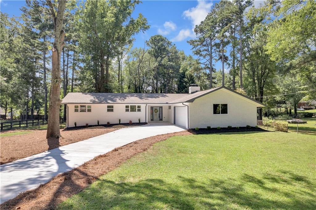 Fully Renovated Marietta Home with Finished Basement and Spacious Backyard
Step into this beautifully renovated home in the heart of Marietta, where modern design meets everyday comfort. The open concept floor plan fills the home with natural light and features a gourmet kitchen with quartz countertops, stylish backsplash, new cabinets, and Samsung stainless appliances, perfect for cooking and entertaining.
With 4 spacious bedrooms and 2 fully updated bathrooms, every detail shines, from elegant tile finishes to brand-new flooring throughout. The finished basement offers endless possibilities, create a game room, home theater, or even a private suite. Plus, it includes a second garage with direct access to the backyard.
Enjoy the outdoors in your expansive, level backyard with lush green lawn, ideal for pets, gatherings, or quiet mornings. Recent upgrades also include a new driveway, garage doors, windows, HVAC, plumbing, and electrical systems, making this home truly move-in ready.
All this in a prime location, just 5 minutes from Wheeler High School, top-rated in the area, as well as shopping, dining, and conveniences.