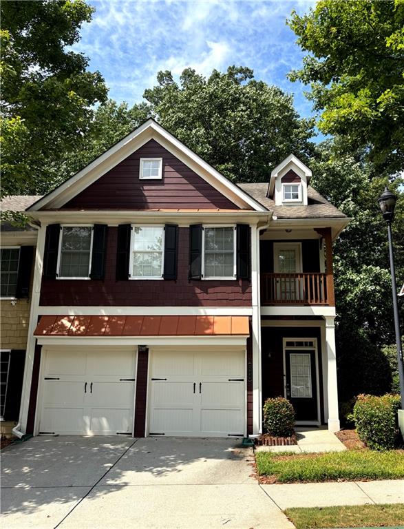 Move in ready! charming 3 bedroom, 2.5 bath townhouse in a gated community. End unit. Hardwood flooring throughout the main level. Kitchen with an island is open to the spacious living room. Upstairs, a master suite with a private bathroom and walk-in closet, and two additional spacious bedrooms. Private backyard. Close to I-85, Gas South Arena, shopping, entertainment, and schools.