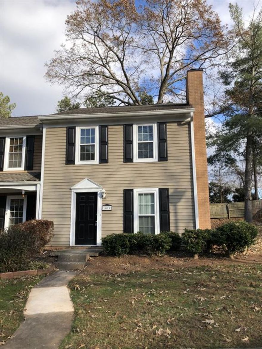 This freshly painted spacious end unit was updated in 2018. The main floor consists of a white galley-style kitchen, living room open to a dining room, half bathroom, and laundry room. Second floor consists of the Primary Bedroom with two closets, guest bedroom, and full bathroom. Outside there is a large, fenced backyard, spacious patio and utility room. There are two dedicated parking spaces in front of the townhouse. Amenities include swimming pool, tennis court and club house. Great Marietta city location - close to area shopping and restaurants! New windows installed in 2014.