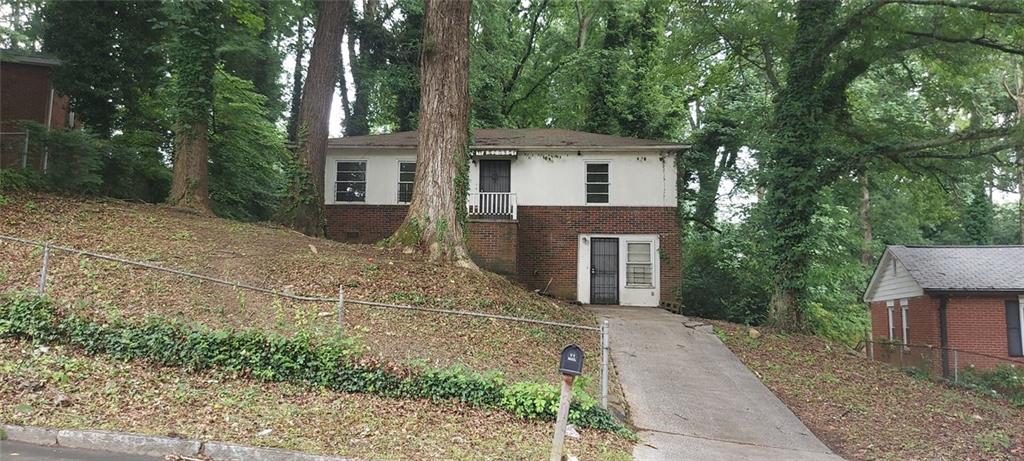 3 Bed 1 bath fixer in Hammond Park. Convenient to Airport, Downtown, East Point, Hapeville & College Park. Garage converted to storage area. Deep wooded lot.