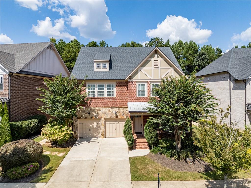 A gated swim/ tennis community. Luxury House with Kitchen Aid SS appliances in highly desirable Alpharetta area. Minutes from GA. 400, Avalon and top rated schools. 10 FT ceiling on first floor and Open plan with modern Kitchen face to Family room with cozy fireplace. Four large bedrooms and 3 bathrooms on 2nd floor. Fresh Interior paint, Fenced backyard. Great location! Move in ready!