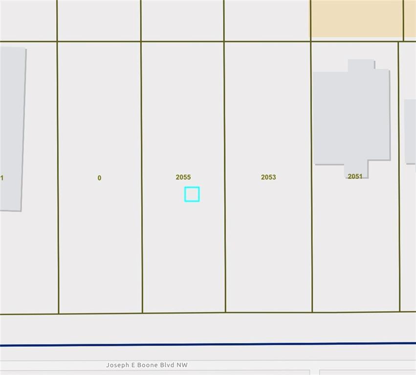 One of two adjacent C-1 lots for sale in Grove Park in the Westside Park Affordable workforce housing overlay. Lot Measures 50' x 150'