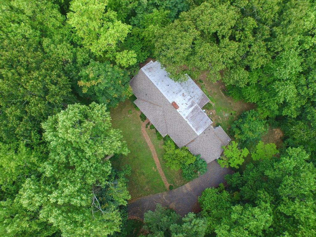 Wonderful opportunity to build a custom home on 17+/- acres. This land is currently zoned as R80 but can be rezoned as R20.n. Located across the street from Sope Creek Park. This land isn't in a flood plain. Located across the street from Sope Creek Park.