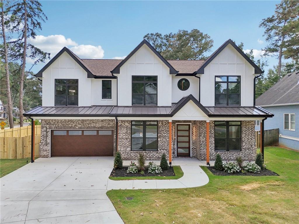 Experience modern luxury in this newly built custom farmhouse, blending high-end design with smart home technology! Situated on a prominent corner lot with no HOA, this residence offers nearly 3,560 sq ft of sophisticated living in a prime Atlanta location. With 5 bedrooms, 4.5 baths, and a versatile bonus room, the layout includes three owner’s suites—one on the main level and two upstairs—each with spa-style baths and generous walk-in closets, including a California-style primary closet. Highlights include soaring 10-foot ceilings & 7-foot windows, walnut hardwood floors, two-story foyer, formal living and dining, and a chef’s kitchen with quartz counters, statement island, smart Forno appliances, 48" stove w/ pot filler, custom cabinets, and bold finishes. The kitchen opens to a family room with fireplace and a keeping room overlooking the covered porch and fenced backyard retreat with pergola. Additional features: dual laundry rooms, designer lighting, 8-foot doors, raised back porch, security system, and seamless indoor-outdoor living. Other upgrades include fully insulated garage, and smart home system including locks, HVAC, and 2 smart toilets for a 5-star experience. Conveniently close to East Lake Golf Club, downtown and midtown, MARTA, and top Atlanta attractions. Don't miss your opportunity to tour this home today!