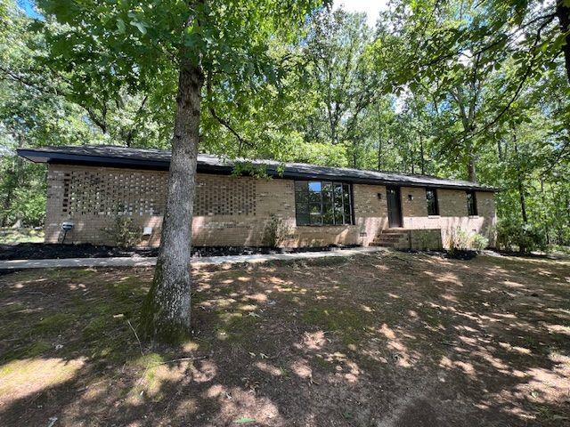 Beautifully renovated brick home - feels brand new! Step inside this classic 4sided brick residence and enjoy a fresh, modern interior that lives like new. Thoughtful updates begin in the heart of the home - the kitchen - where crisp white cabinetry, gleaming granite countertops and brand new stainless steel appliances make cooking a joy. A nearby laundry/mud room includes a modern washer and dryer and opens to an expansive backyard, making daily chores easy and offering a seamless flow for living. The layout features hardwood floors and abundant natural light. A brick fireplace anchors the main living area, and a separate formal living/dining room provides flexibility for entertaining or a quiet home office. Three comfortable bedrooms include a primary suite and two pristine, completely updated bathrooms with contemporary finishes and all new fixtures and lighting. Every room has been freshly painted, and updated lighting throughout gives the home a bright, inviting feel. Outside, the large yard offers plenty of space for gardening, play or future expansion, while the clean carport with an attached utility closet keeps tools and bikes neatly tucked away. Set in the established Kingswood area of Athens, you're minutes from schools, parks, shopping and the University of Georgia. Don't miss your chance to own a like new home in this sought after community. Schedule your showing today and experience the quality of this renovation for yourself!
Remarks Private