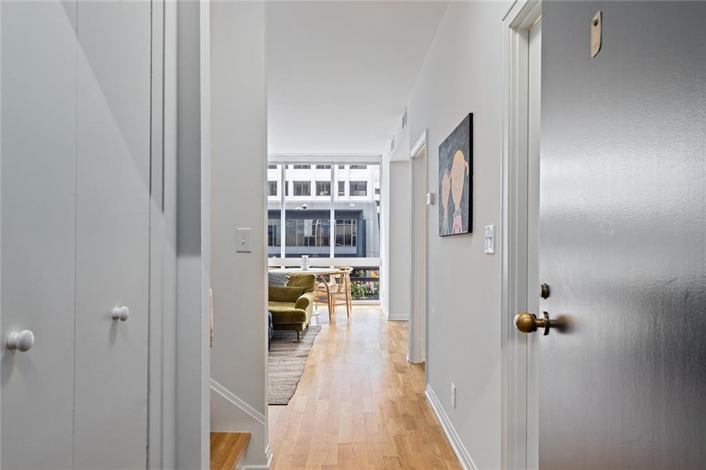 Stunning fully renovated multi story two bedroom / 2.5 bathroom condo at the coveted Colony House! Just steps from Colony Square’s shops, restaurants, and entertainment—and a short walk to Piedmont Park, the BeltLine, the High Museum, and the Botanical Gardens—this is city living at its very best.
From the moment you walk in, floor-to-ceiling windows flood the space with natural light and showcase sweeping city views. The spacious living room flows seamlessly into the dining area, while the renovated kitchen features quartz countertops, ample cabinet space, and a brand-new Sub-Zero refrigerator. A stylish half bath completes the main level.
Upstairs, you’ll find a flexible loft space, a guest bedroom perfect for a home office or bedroom, and a spacious owner’s suite with a walk-in closet and a renovated bath.
As part of Colony Square, residents can rent unlimited parking spaces for $150 per car, and the newly reimagined development right outside your door offers top restaurants, IPIC Theater, yoga, spa services, and even a hotel for out-of-town guests.
Don’t miss the chance to live in one of Midtown’s most iconic addresses—this is the perfect blend of style, convenience, and walkability.