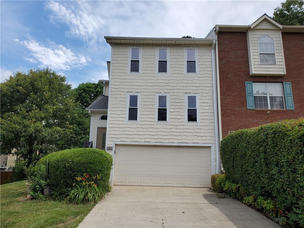 Awesome location for this 3 bed 2 1/2 bath townhome on a private cul de sac lot. Two car drive under garage with remote. Large back deck with private yard. Rare for a townhome. Hardwood floors throughout most of the home. Livingroom with separate dining area. Loft. Two large bedrooms and one bedroom and office in finished basement. This home shows well and has great schools. vacant.