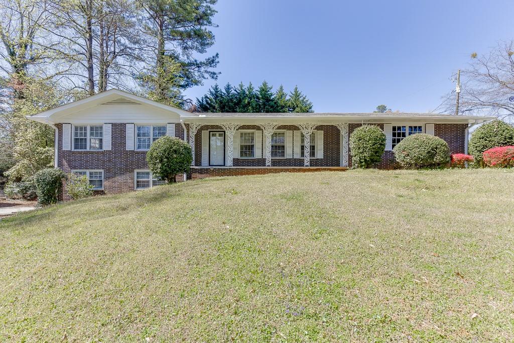 This updated ranch-style home is available for lease in Brookhaven! BRAND NEW KITCHEN UPDATE AS OF 6/23! Yard maintenance included! The main level includes a 2-car garage, a covered front porch, extra driveway space, and a fenced backyard. Inside, you'll find an open-concept floor plan with 3 bedrooms and 2 full bathrooms. The finished terrace level features a bedroom, full bathroom, and additional living space, plus plenty of unfinished storage. Conveniently located just minutes from the highway, Briarwood Park, and Lenox.