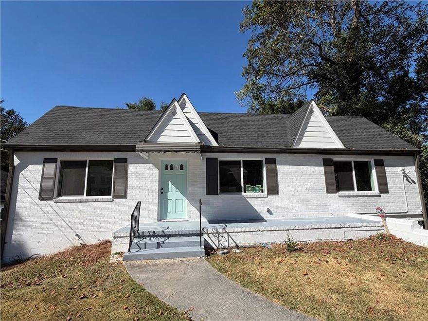 Welcome to 141 Stafford Street SW—an all-brick, beautifully renovated 4BR/3BA home in the heart of Atlanta’s vibrant Westside. Fully updated with a brand-new roof, new windows, and fresh finishes throughout, this move-in-ready residence showcases a gourmet kitchen with white shaker cabinets, quartz countertops, a seated island bar, and stainless-steel appliances. The main-level owner’s suite offers a walk-in closet and a sleek, refreshed bath. A full, finished basement adds true flexibility with a complete second kitchen (appliances included), laundry, and a full bath—ideal for guests, a home gym, or a media space. The basement features its own dedicated AC, enhancing comfort and contributing to overall energy efficiency. Enjoy close proximity to the BeltLine, Mercedes-Benz Stadium, Lee + White Food & Beverage District, and downtown attractions. Easy access to I-20 and major thoroughfares makes commuting a breeze. Whether you’re a first-time buyer, investor, or seeking a stylish city retreat, this Westside gem checks all the boxes.