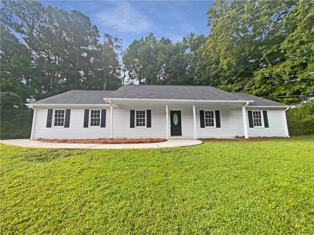 Welcome to this beautifully updated home. The interior boasts a neutral color paint scheme, fresh paint, and new flooring throughout. The kitchen is a chef's dream with a accent backsplash, and all stainless steel appliances. The primary bathroom features double sinks. Partial flooring replacement adds a touch of modernity. The exterior is equally impressive with fresh paint, a new roof, and a patio in the back yard for outdoor enjoyment. This home is a must-see!. 100-Day Home Warranty coverage available at closing