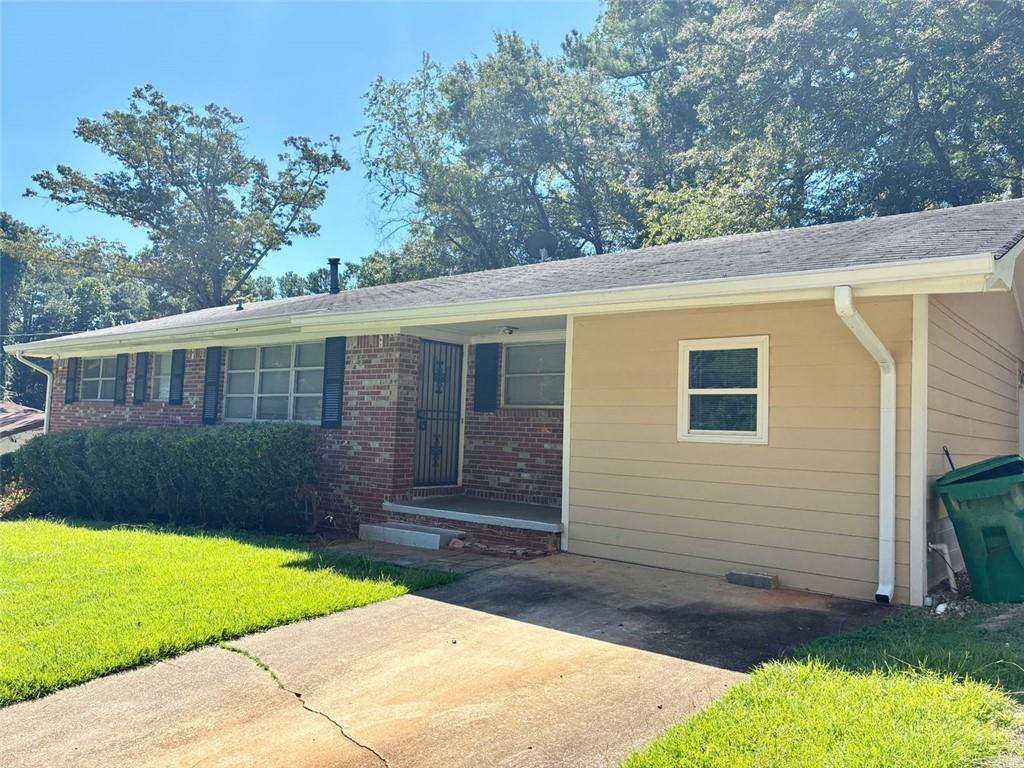 Affordability inside I-285!! Perfect 1st starter home, downsizing home, or investment property with the potential of 4 bedrooms. This home qualifies for Down Payment Assistance. Ask Listing Agent for more info. Welcome to this charming all-brick ranch home with good solid bones! Perfectly situated on a quiet street with friendly neighbors who look out for one another, this move-in-ready home offers both comfort and versatility.
Inside you will find a spacious open layout. Upon walking in the front door, you step into the light-filled living room with original hardwood floors. The living room opens to the dining room, kitchen and hallway leading to the bedrooms. Envision your furniture in the spacious bedrooms. The primary bedroom has it's own half-bathroom. PLUS, there is a bonus room that can serve as a family room, den, home office, or even a fourth bedroom—ideal for customizing to your needs. Enjoy outdoor living by relaxing on the front porch in a comfy rocking chair, or having a BBQ on the back patio overlooking a large, beautiful fenced backyard, perfect for family relaxation time and entertaining. There is also a partial unfinished basement ready for your personal touch or extra storage.
Recent updates include a roof approximately five years old and a new furnace installed in 2024, ensuring worry-free living. Whether you choose to update the home or leave it as is, you'll find it offers great potential in an established community close to shopping, schools, major highways, retail centers, fantastic dining options and the gorgeous Michelle Obama walking trail. This sturdy, well-maintained home combines comfort, location, and potential—don't miss your chance to make this wonderful property your new home! HOME IS BEING SOLD AS-IS! NO BLIND OFFERS WILL BE CONSIDERED.