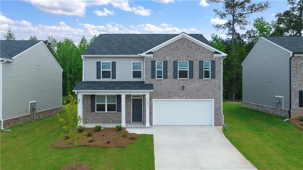 “Located just minutes to I-75, Incredible Junior Size Olympic pool with Cabana, Playground, Dog park, Walking Trails and Rec field - Just steps to J.P. Mosely Park. FULL APPLIANCE PACKAGE. *The Hanover Plan* Perfect for today's busy lifestyles, this design offers an expansive island kitchen that opens to a breakfast area and spacious family room. Formal living and dining are perfect for entertaining. Private bedroom suite features a spa-like bath, plus there is a versatile loft. And you will never be too far from home with Home Is Connected. Your new home is built with an industry leading suite of smart home products that keep you connected with the people and place you value most. Cabinet color options include gray and white. Photos used for illustrative purposes and do not depict actual home.
