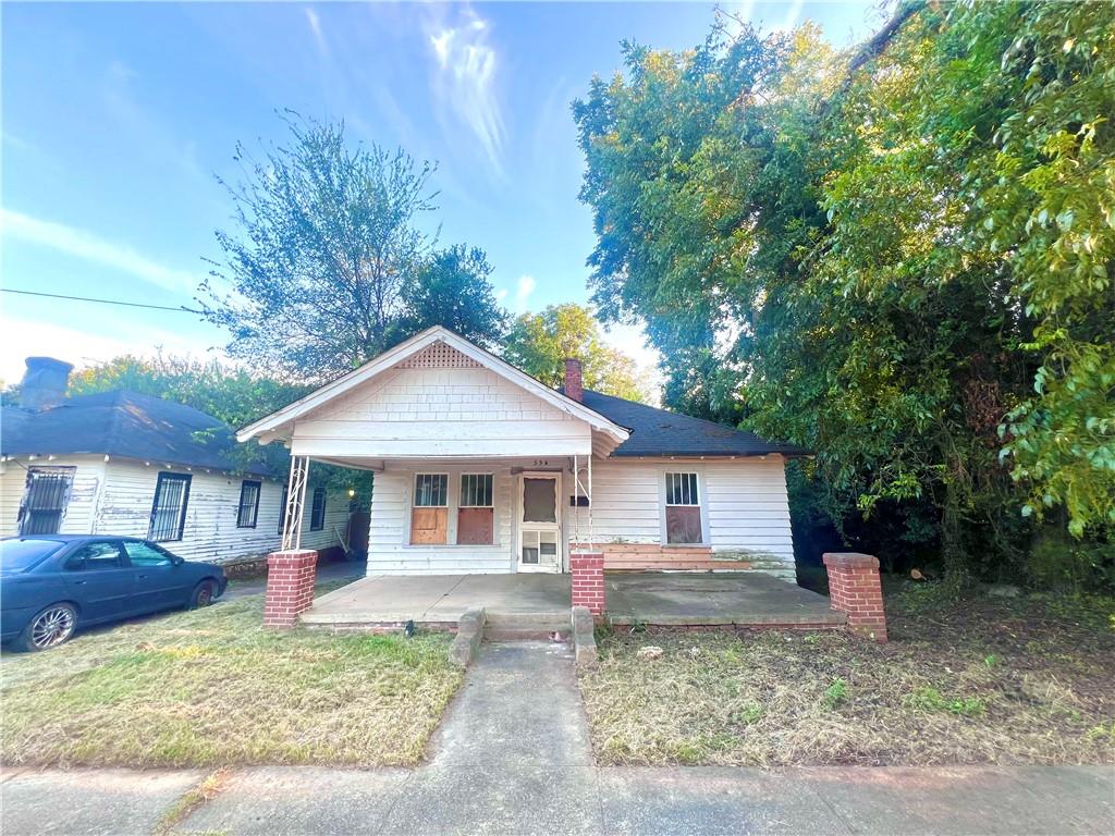 Investor Special - Full Rehab. This property is ideally in a growing neighborhood with significant upside potential. Whether you're looking to fix and flip, buy and hold, or secure an affordable starter home. Close to Atrium Health Navicent, and walking distance to established shopping and dining with easy access to I-75 and downtown Macon. Bring your highest and best offer! Sold As Is