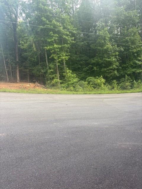 Beautiful 2.4980 ACRES of land in Gwen Acres Subdivision surrounded by expensive homes. Build your Dream Home, bring your builder and plans. Enjoy the space and privacy being in a Dead End street. SOIL TEST DONE. Cobb Schools. Great location with easy access to Hwy 41 and I-75. Gorgeous homesites. The home next door #5098 shows a value of over $1M. The listed property is about 6 miles to Lake Allatoona Boat Rentals, Just 2 minutes to Wellstar Acworth Health, convenient to grocery stores and shopping, couple of miles from the Governors Towne Club and Golf Course. Motivated Seller and Priced to Sell. Don't miss out!