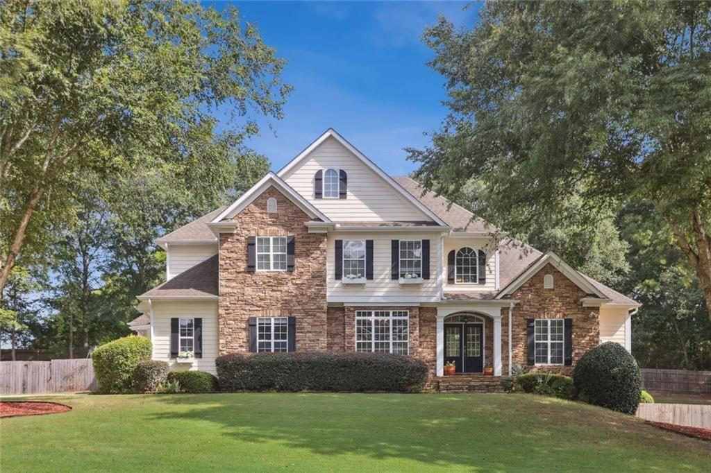 Welcome home to this absolutely stunning, meticulously maintained property in Cathy Estates. Nestled on almost an acre, this charming community has direct access to Peachtree City’s golf cart path connection, Kedron Village, and with quick access to I-85, making it a commuter’s dream.
Lush landscaping and a welcoming covered front porch with double doors leads into a soaring two-story family room filled with natural light, and a stone fireplace. Serene views of the private backyard oasis, is complete with a large deck, PebbleTec® saltwater pool, hot tub, and waterfall spa.
This beautiful home also features a renovated kitchen (June 2025) featuring all-new appliances, farm sink, new lighting, new cabinets, French Country island, and a vaulted keeping room with a second fireplace. A formal dining room or office easily seats 12. Newly renovated half bath with vanity and lighting. New paint and new lighting throughout. Updated laundry/mudroom with added functionality and style, leading directly into the three-car garage with brand-new stairs and an epoxy-coated floor.
Spacious owner’s suite with tray ceilings and private access to the covered back porch. Renovated master bath includes dual vanities, vaulted ceilings, private commode, soaking tub, frameless shower, and massive daylight walk-in closet.
Upstairs features new carpet, loft with built-in cabinetry and desk space, 2 spacious bedrooms with walk-in closets and a jack and jill bathroom. Also includes a 3rd private en suite with a walk-in closet and private bath perfect for guests.
Fully remodeled terrace level (2025) is the ultimate flex space, offering bar/kitchen, full bath, large rec room, exercise space, new flooring, and space for a game room. Large unfinished space, great for storage. Side entrance opens to a newly landscaped and hardscaped backyard (July 2025), offering seamless indoor-outdoor living. Also features a 3-car, side-entrance garage, parking pad, and completely fenced backyard, with landscaped greenspace, mature trees, and garden space.
Major system updates have already been done for you, including a brand-new roof and gutters (2025), new tankless water heater (2024), main level HVAC 2023, and brand-new flooring throughout (June 2025). So many incredible details to create a luxurious, move-in ready experience!
This home truly checks all the boxes - don’t miss your chance to fall in love!