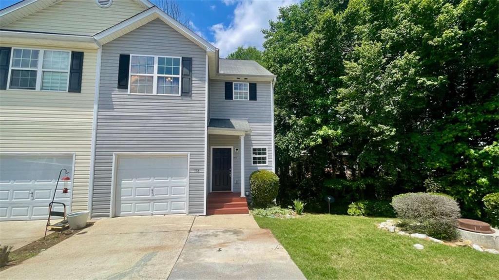 Spacious 3BR/2.5BA Townhome in the Heart of Hiram! Tucked away in a quiet, well-maintained community just minutes from Downtown Hiram, this roomy townhome offers comfort and convenience in an ideal location. Step inside from the welcoming front porch stoop into a large, open-concept living and dining area that flows seamlessly into a bright kitchen featuring white wood cabinetry, a walk-in pantry, generous breakfast bar, LVP flooring, and included stainless steel appliances (range, dishwasher, and microwave) along with a small private deck in the back, perfect for a grill and a couple of chairs overlooking a wooded backyard. Downstairs includes a full basement partially finished perfect for recreational space and storage! Upstairs, you’ll find a spacious primary suite with an en suite bathroom, two additional bedrooms, a second full bath, and a laundry closet for added convenience. Parking is a breeze with a dedicated 2-car parking pad right out front and a 1 car garage also perfect for storage. This home is perfectly situated near local dining, shopping, and groceries—including Walmart—and offers easy access to everything downtown Hiram has to offer. Simple application process. yard maintenance, trash, water included. Contact us today for more details or to schedule a showing!